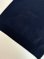 Navy crew-neck knit sweater sleeve and cuff with ribbed hem and subtle Gucci logo