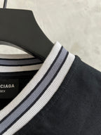 Black T-shirt collar with white and navy striped ribbed trim