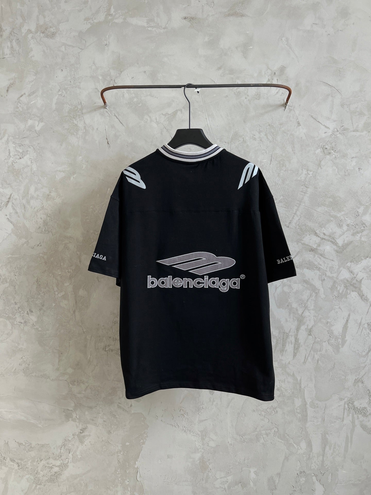 Black short-sleeve T-shirt with large Balenciaga graphic and striped collar