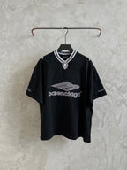 Black short-sleeve T-shirt on hanger with striped ribbed collar and small crest emblem