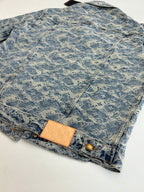Long denim jacket with blue monogram print, front flap pocket and button details