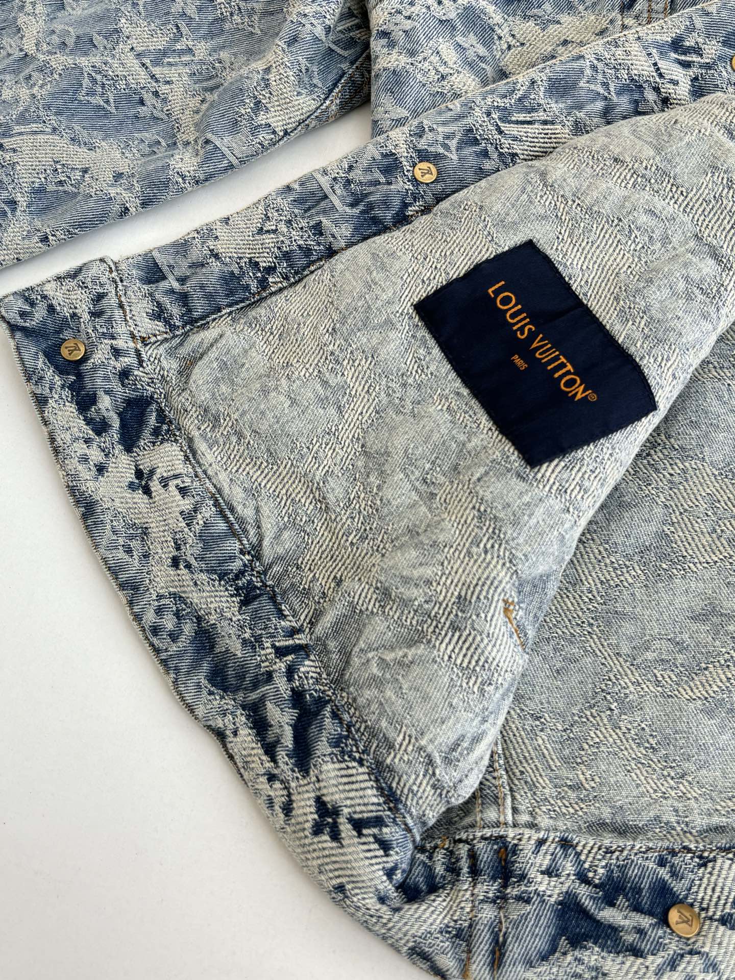 Blue long denim jacket with inside Louis Vuitton label patch