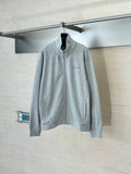 Grey Gucci zip-up jacket on hanger, standing collar, small chest logo
