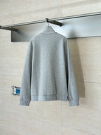 Grey Gucci zip-up jacket on hanger, full back view, standing collar