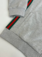 Grey pants with green-red stripe side band and ribbed cuffs