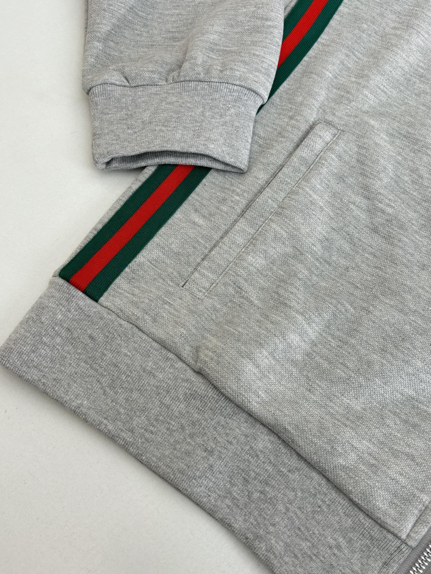 Grey pants with green-red stripe side band and ribbed cuffs