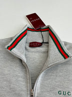 Grey Gucci zip jacket collar detail with green-red web stripe trim