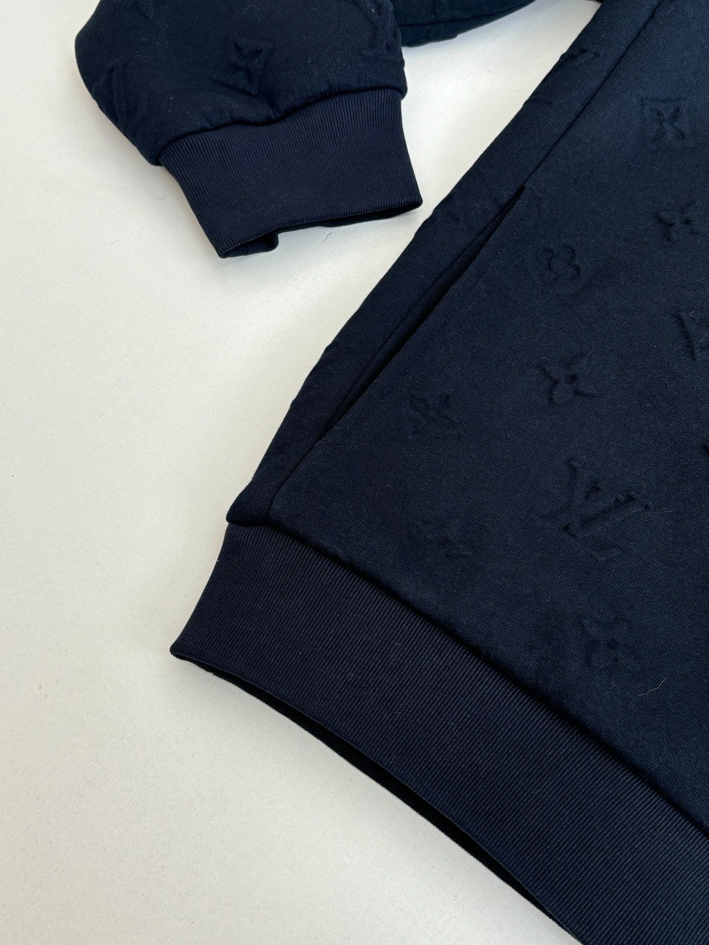 Louis Vuitton navy monogram track pants with ribbed cuffs