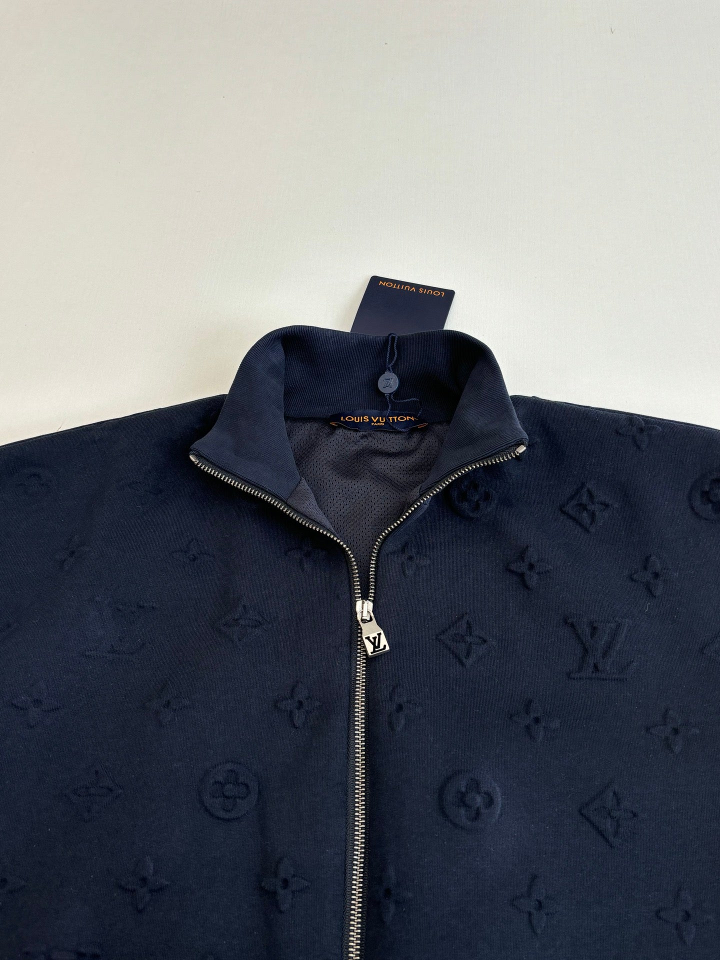 Louis Vuitton navy monogram full-zip jacket collar close-up