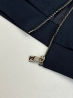 Louis Vuitton navy jacket zipper detail with metal pull