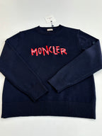 Navy crewneck knit sweater with red MONCLER logo on the front