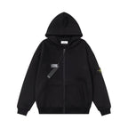 Zip-up hooded sweatshirt in black with full zipper, hood, and small sleeve logo patch