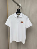 White Burberry polo shirt with button placket and chest logo patch