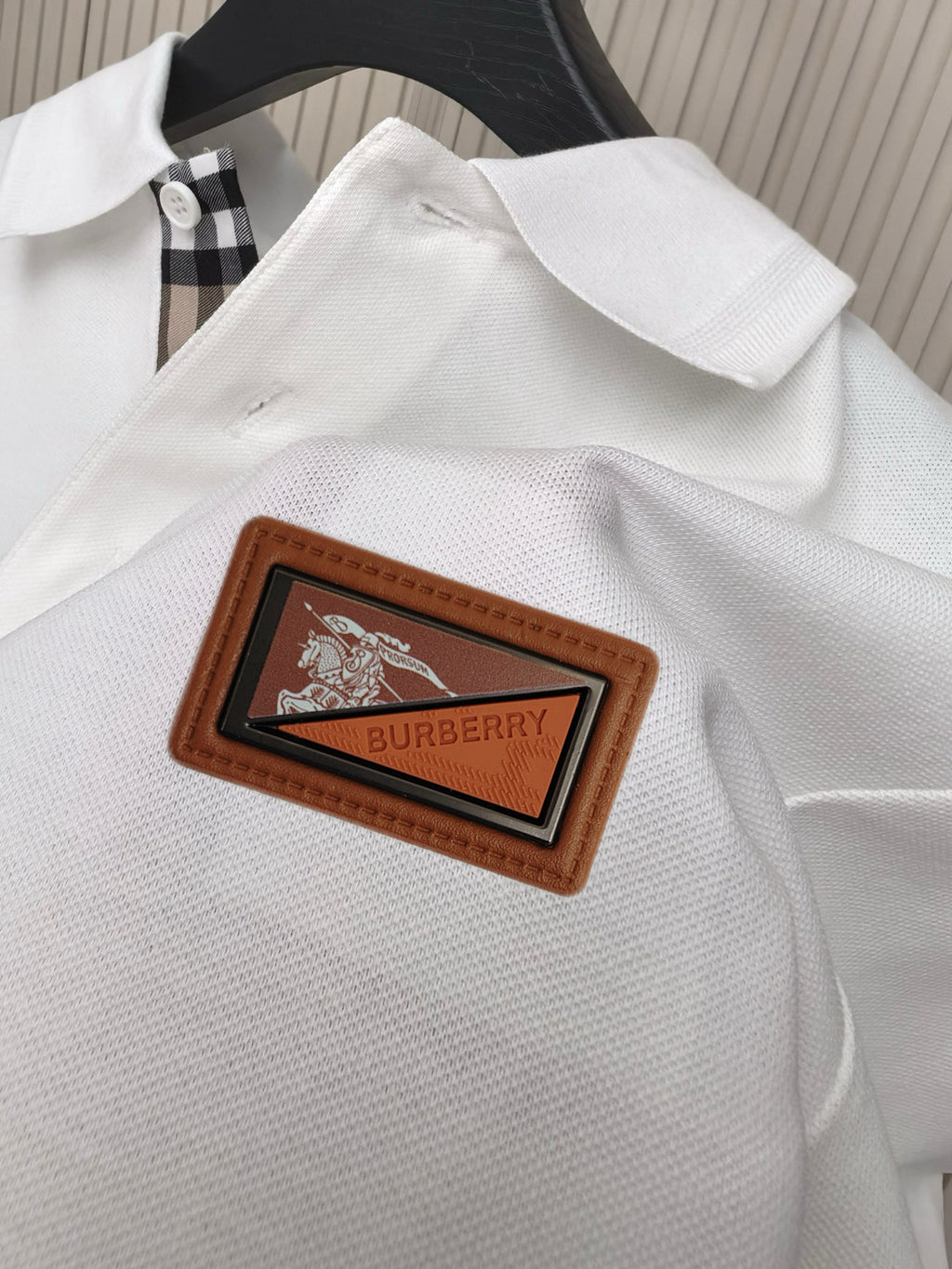White polo shirt with Burberry woven leather logo patch