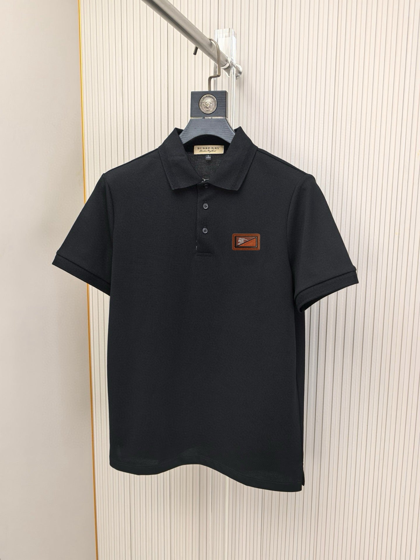 Burberry polo shirt, dark navy short sleeve with button placket and chest logo patch