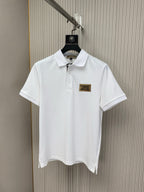 White polo shirt with point collar and button placket, small Burberry London England logo