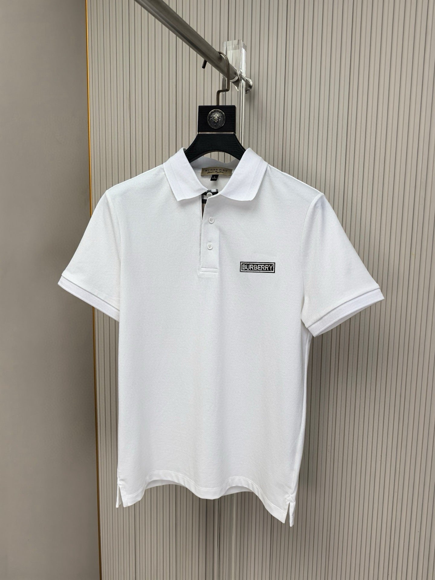 Burberry short-sleeve polo shirt, white with button placket and chest logo patch