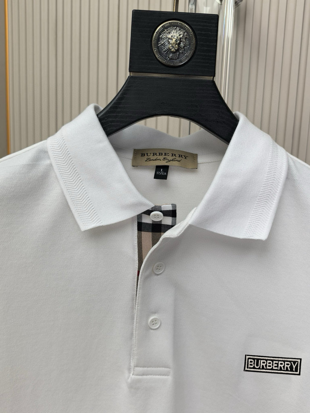 Burberry polo shirt neckline with ribbed collar and logo label on left chest