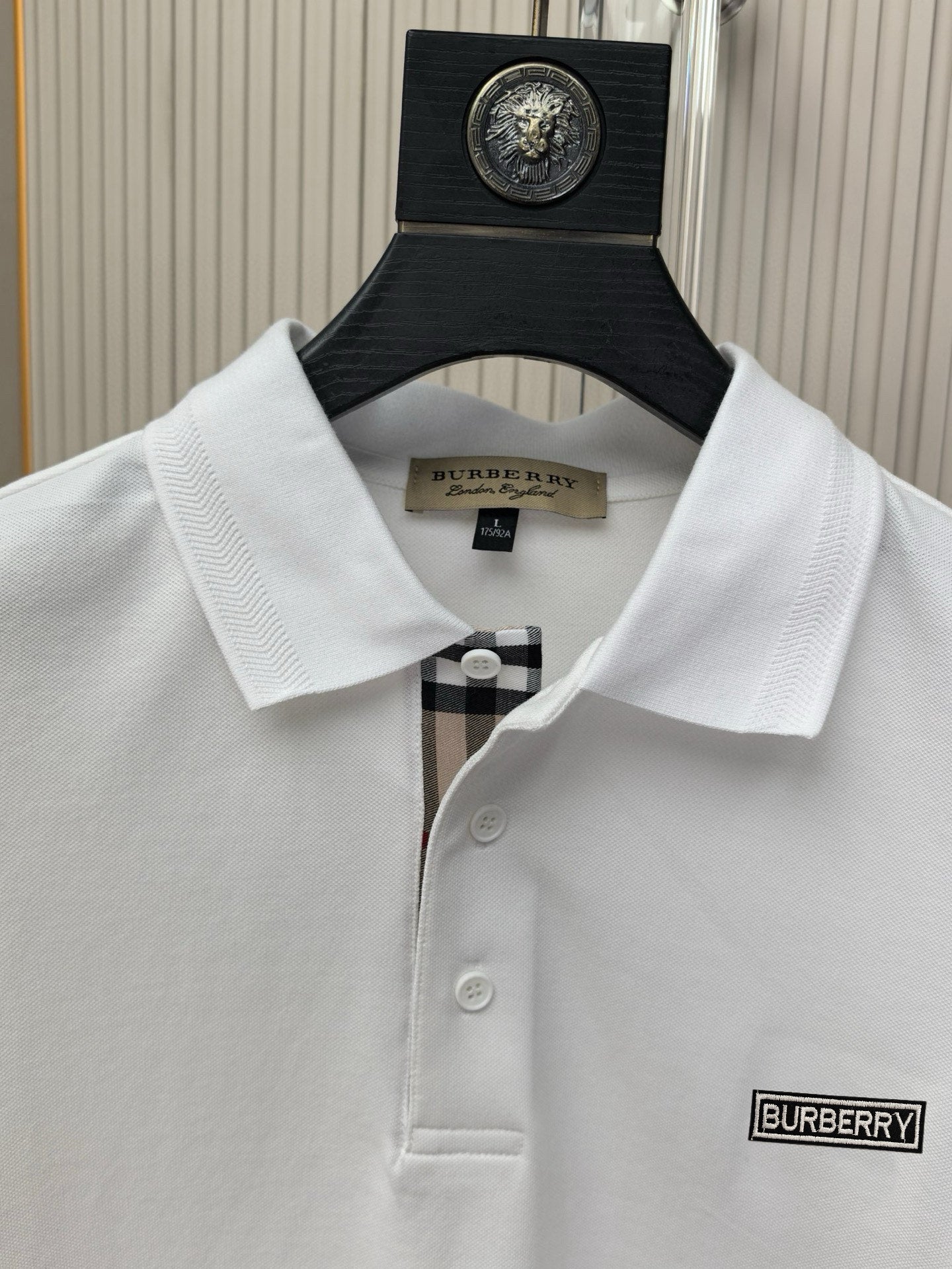 Burberry polo shirt neckline with ribbed collar and logo label on left chest
