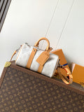 Louis Vuitton handbag with white monogram canvas and tan leather straps, top handles