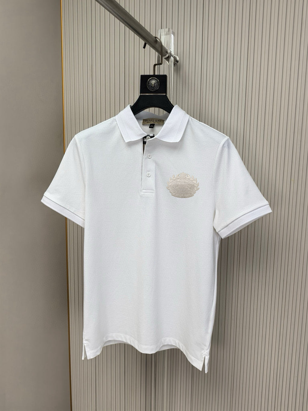 White Burberry short-sleeve polo shirt with chest crest logo and button placket