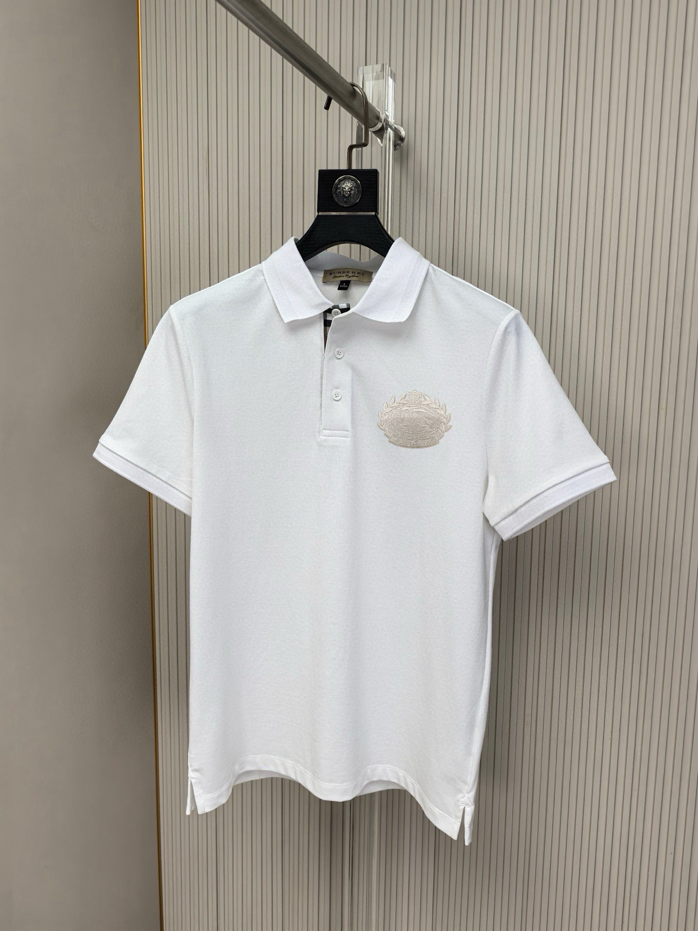 White Burberry short-sleeve polo shirt with chest crest logo and button placket