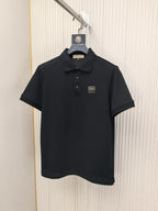 Burberry short-sleeve polo shirt, dark navy with buttoned collar and chest logo patch