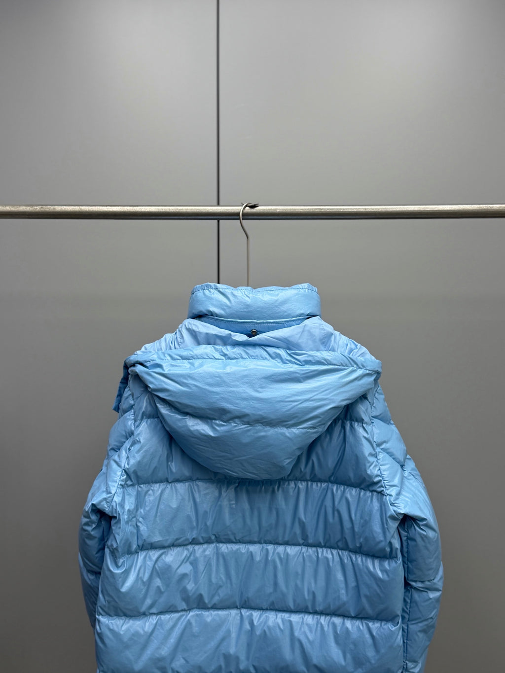 Moncler hooded puffer jacket, light blue, back view with high collar