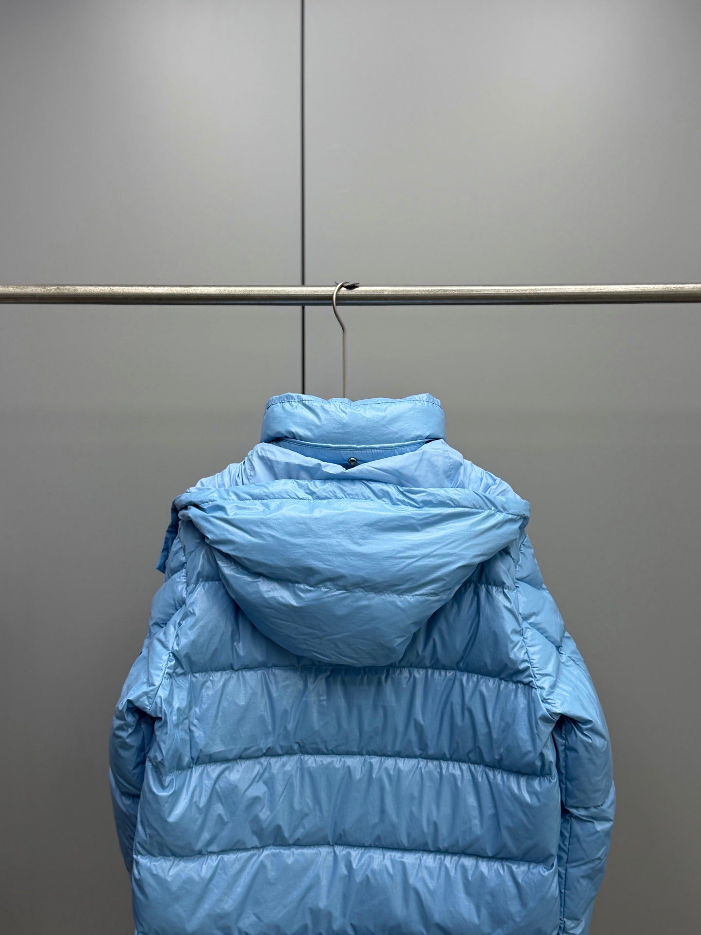 Moncler hooded puffer jacket, light blue, back view with high collar