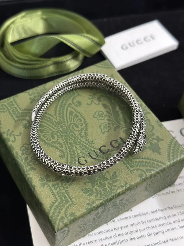 Silver-tone double chain bracelet arranged in a circle with clasp facing right