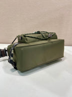 Olive Prada bag with top handle and multiple straps, shown from the side