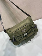Olive Prada crossbody bag with long strap, quilted front, and flap front