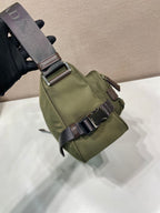 Olive Prada mini bag with dark webbing strap and silver buckle hardware