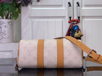 Louis Vuitton duffel bag with tan leather side panel and adjustable shoulder strap