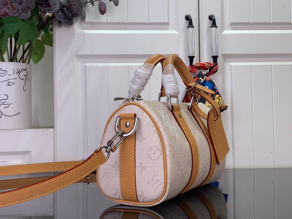 Men's Louis Vuitton duffel bag, rounded silhouette, beige canvas with tan strap