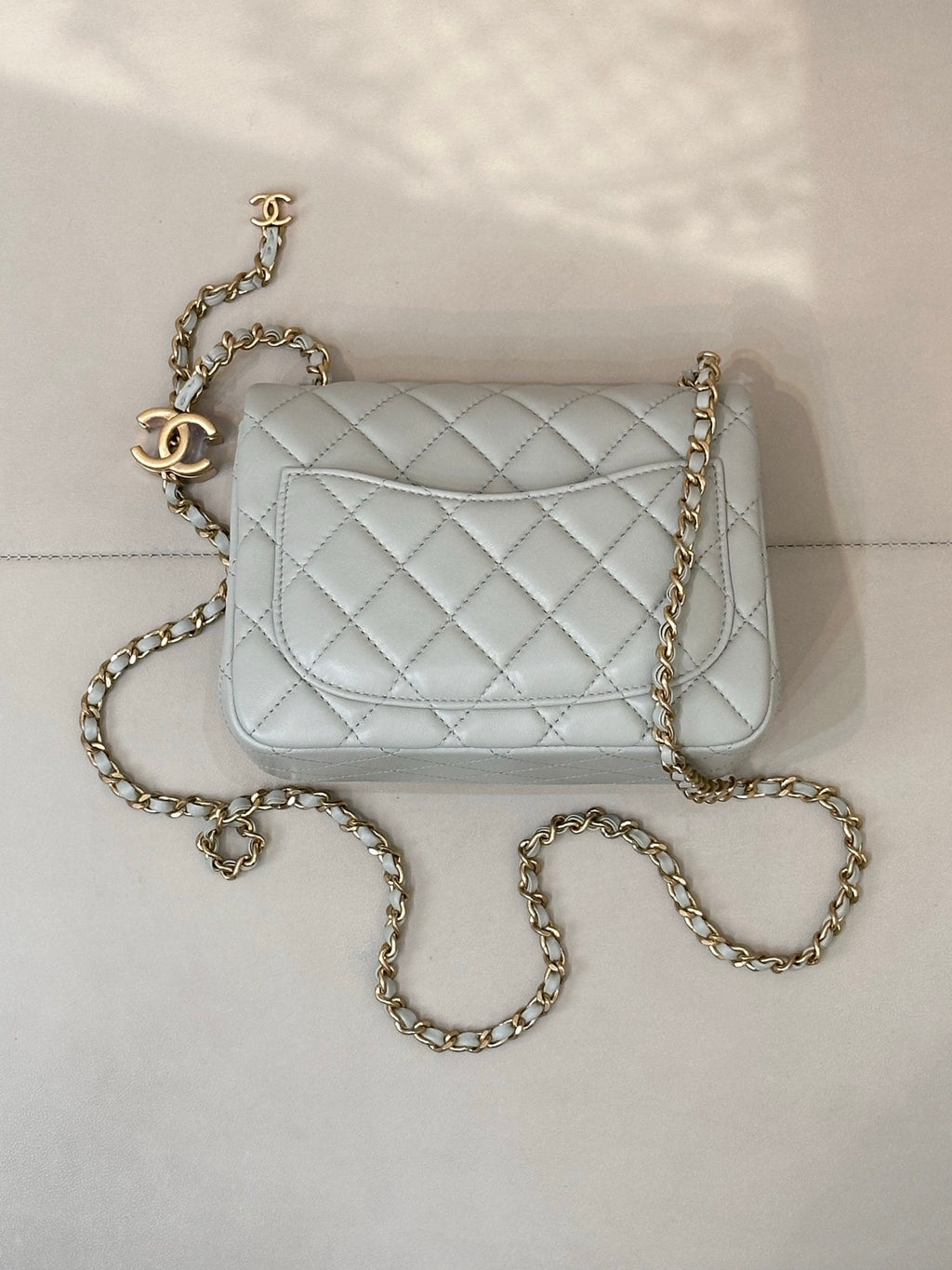 Chanel quilted shoulder bag, light blue with gold chain and CC logo on flap