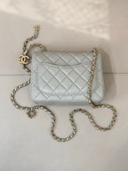 Chanel quilted shoulder bag, light blue with gold chain and CC logo on flap