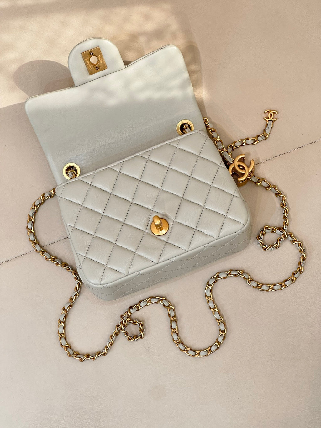 Chanel quilted crossbody bag, light blue top handle with gold hardware