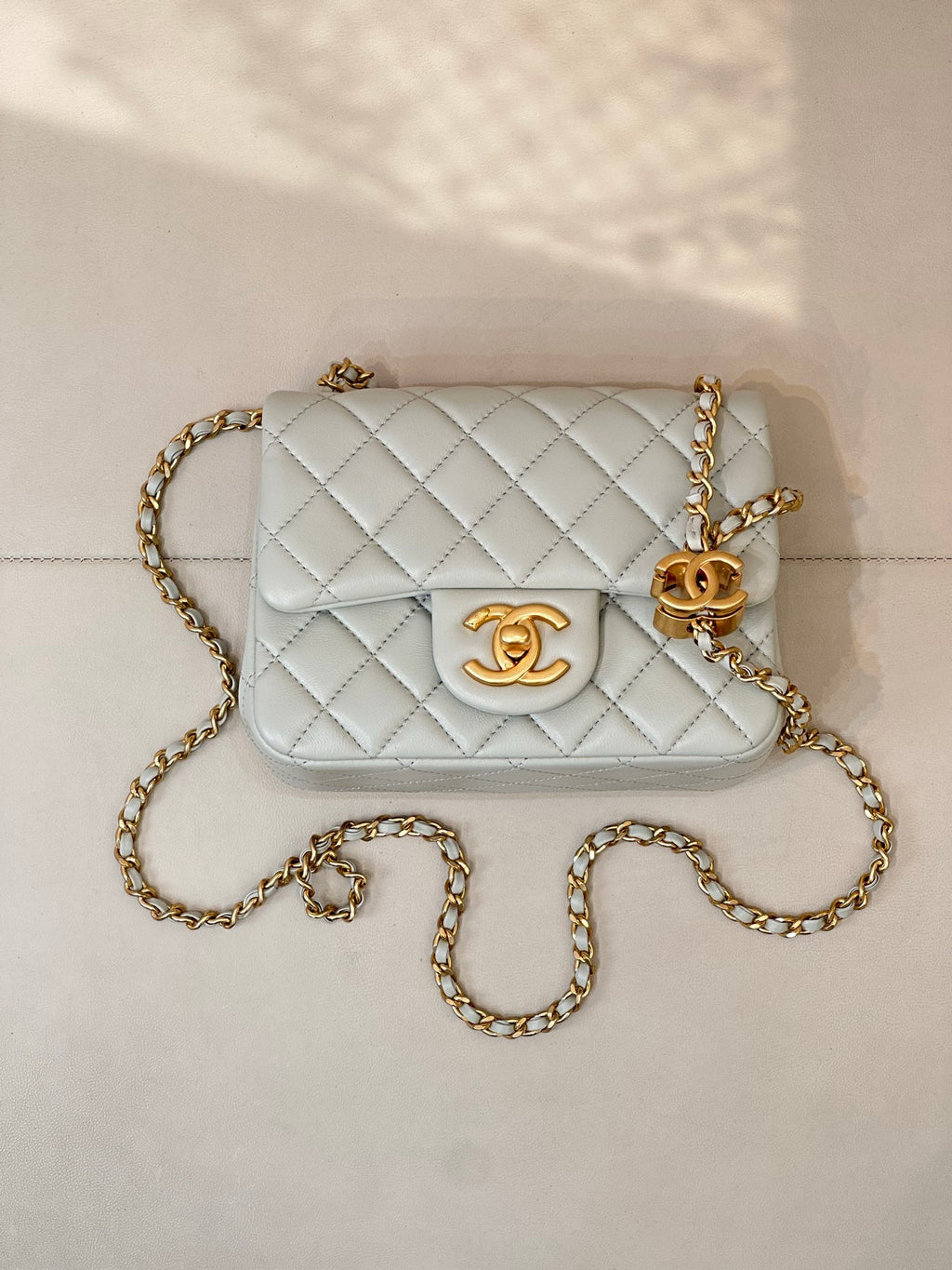 Chanel quilted shoulder bag, light blue with gold chain and front flap CC emblem
