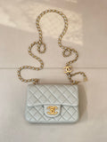 Chanel quilted shoulder bag, light blue with gold chain and CC logo