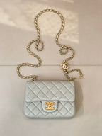 Chanel quilted shoulder bag, light blue with gold chain and CC logo
