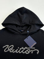 Black Louis Vuitton hooded sweatshirt with drawstring hood and logo detail