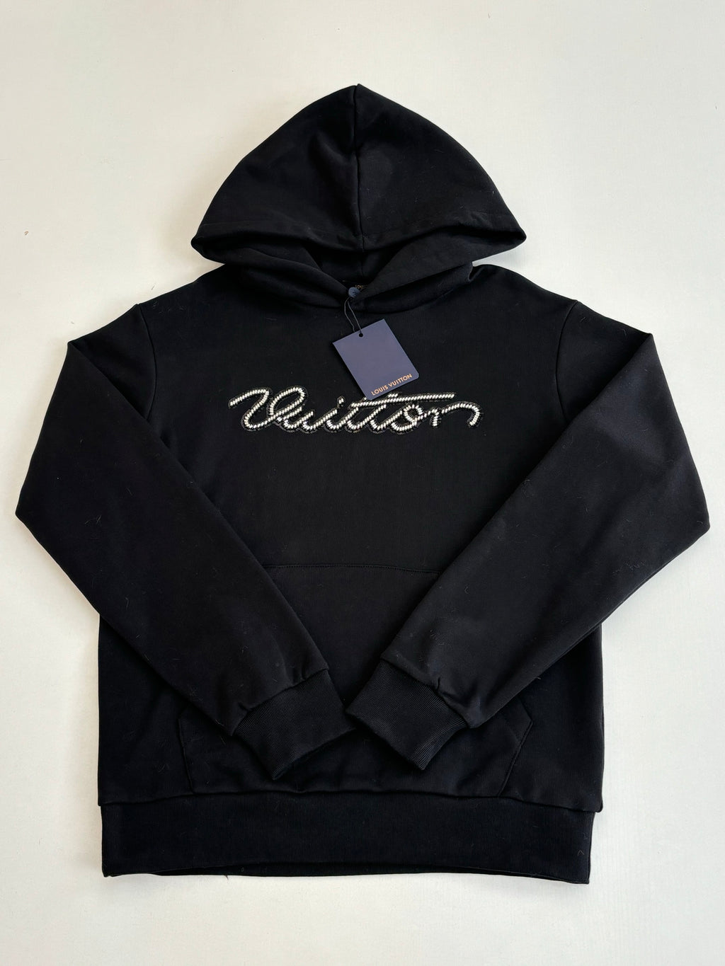 Black Louis Vuitton hooded sweatshirt with cursive chest logo and drawstring hood