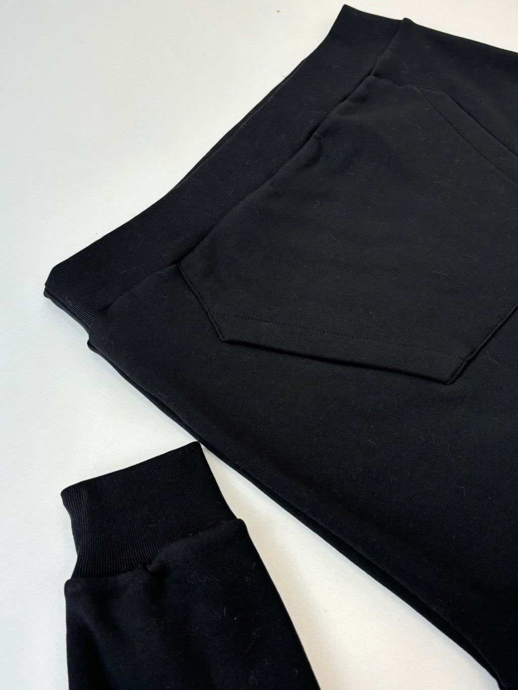 Black Louis Vuitton hooded sweatshirt sleeve cuff and hem detail