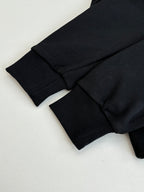 Black Louis Vuitton hooded sweatshirt sleeve cuff and folded hem