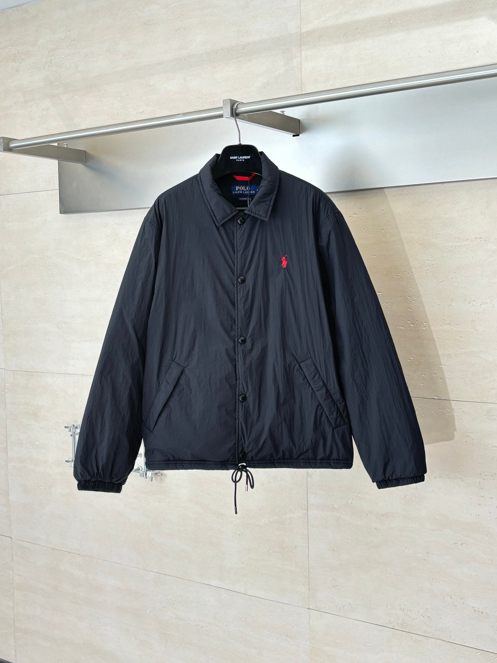Ralph Lauren navy button-up jacket with red polo logo and stand collar