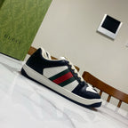 Gucci unisex sneakers with striped web detail, navy upper, white toe, lace-up