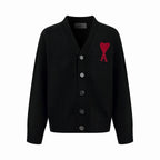 Amiri black knit cardigan with button front and red Ar motif on chest