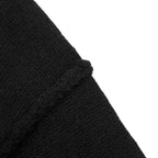 Amiri black knit cardigan fabric texture and V-neck seam