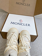 White Moncler low-profile sneakers with lace-up closure, set in box